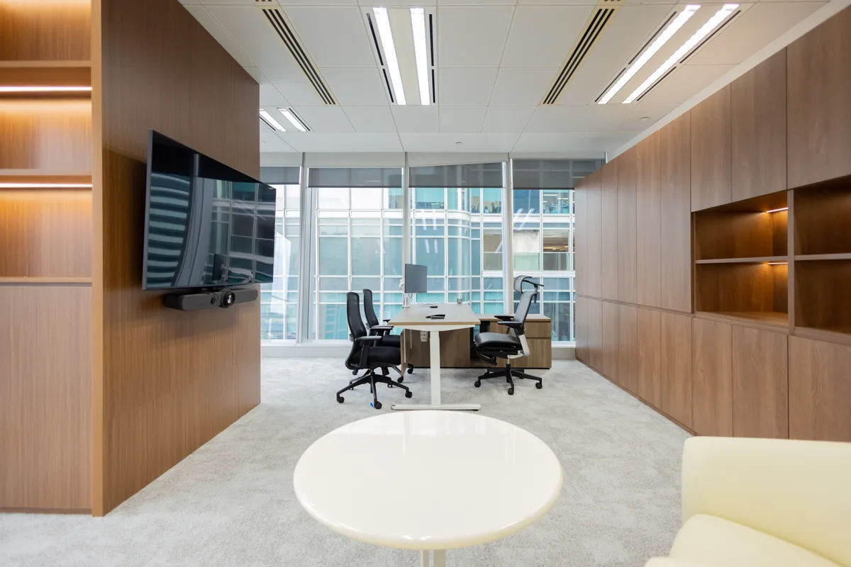 Hong Kong executive office interior with timber detailing and commercial fit out craftsmanship