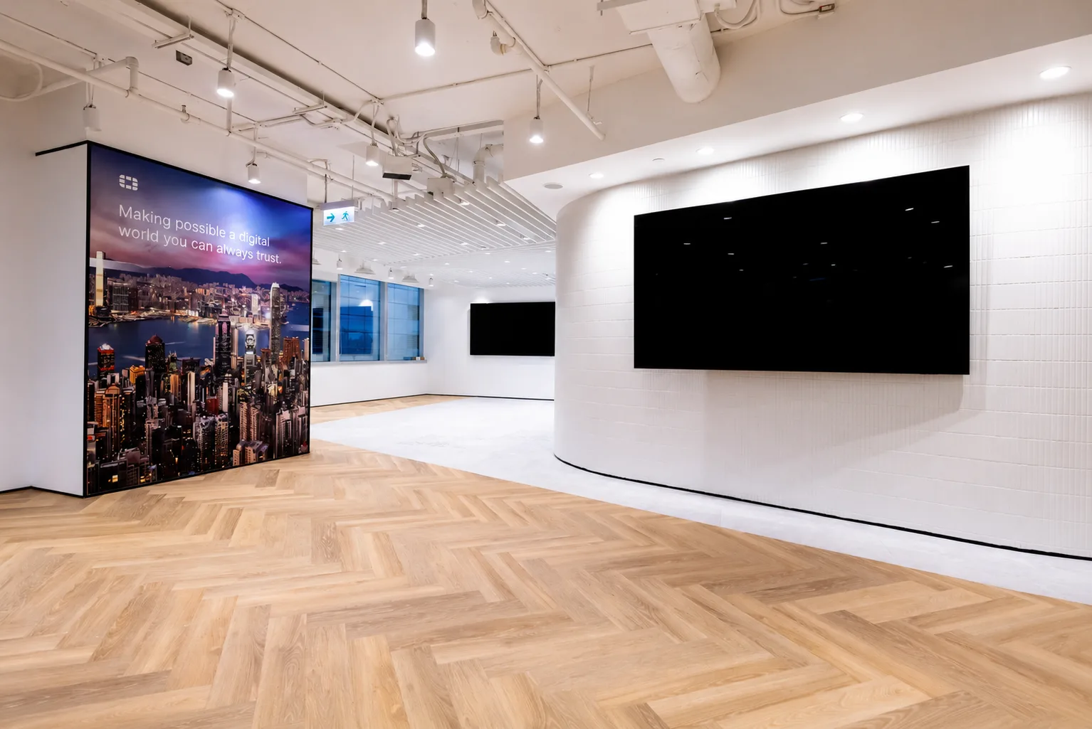 Hong Kong office arrival area with herringbone timber flooring