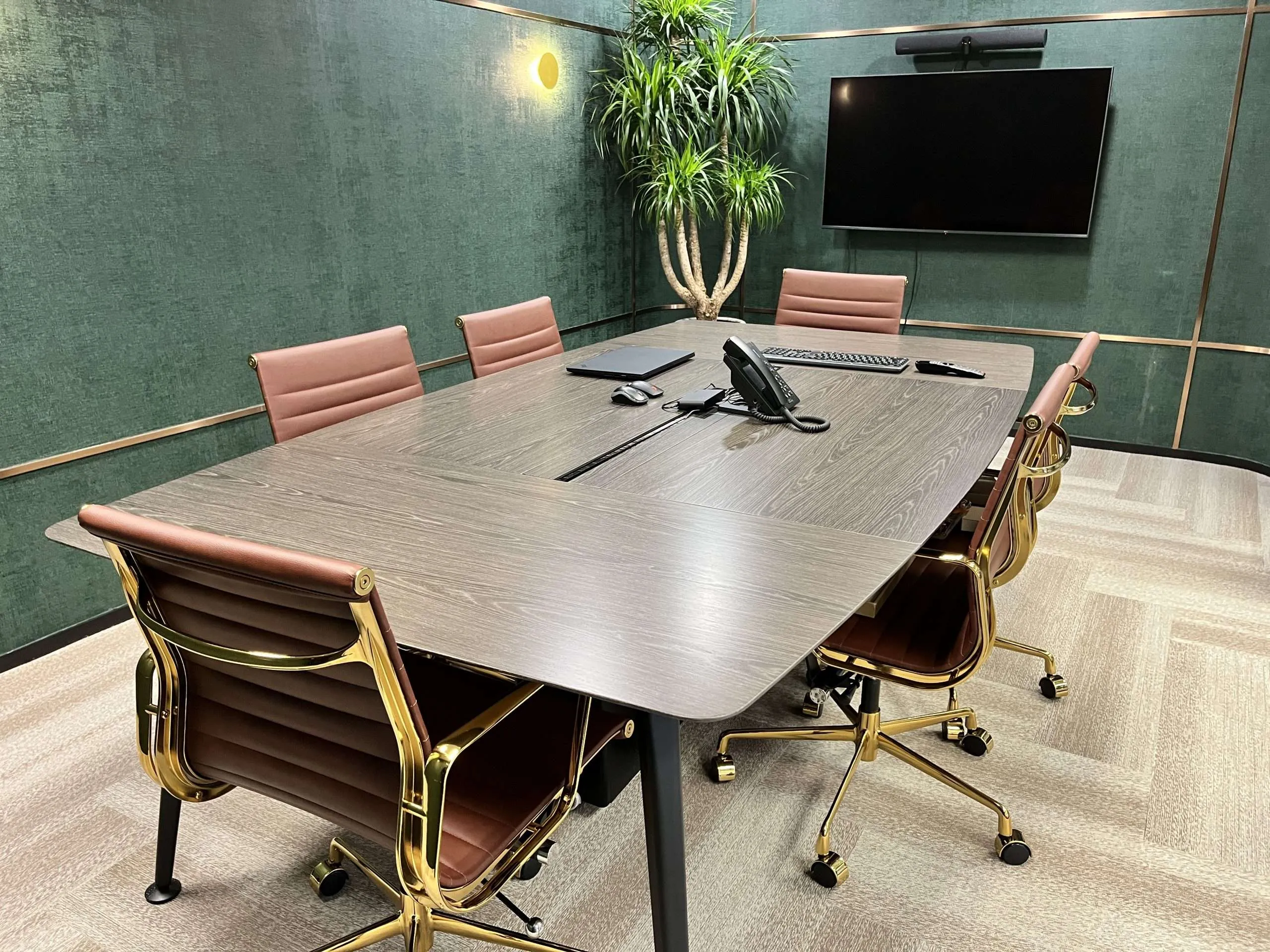 Hong Kong office meeting room interior with textured walls and presentation screen