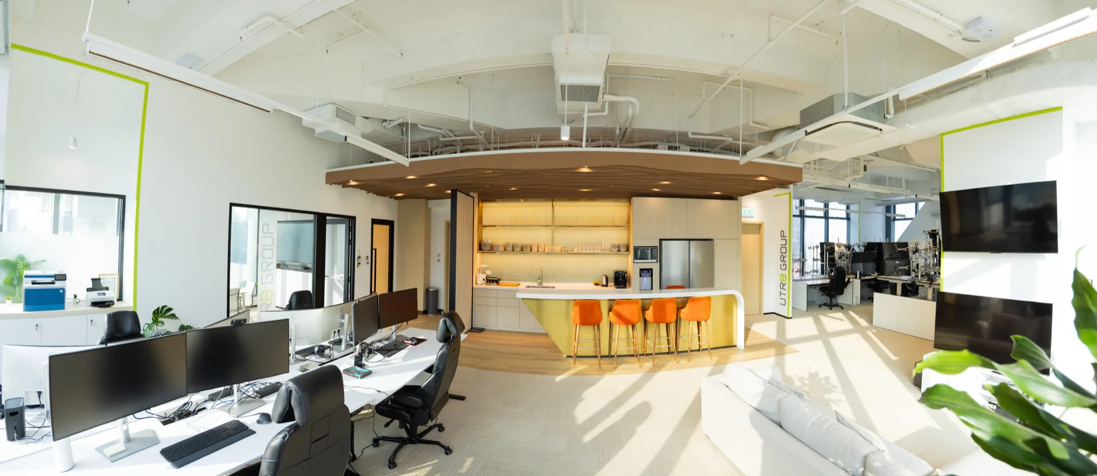 Completed open-plan office with coordinated workstations, lighting and circulation