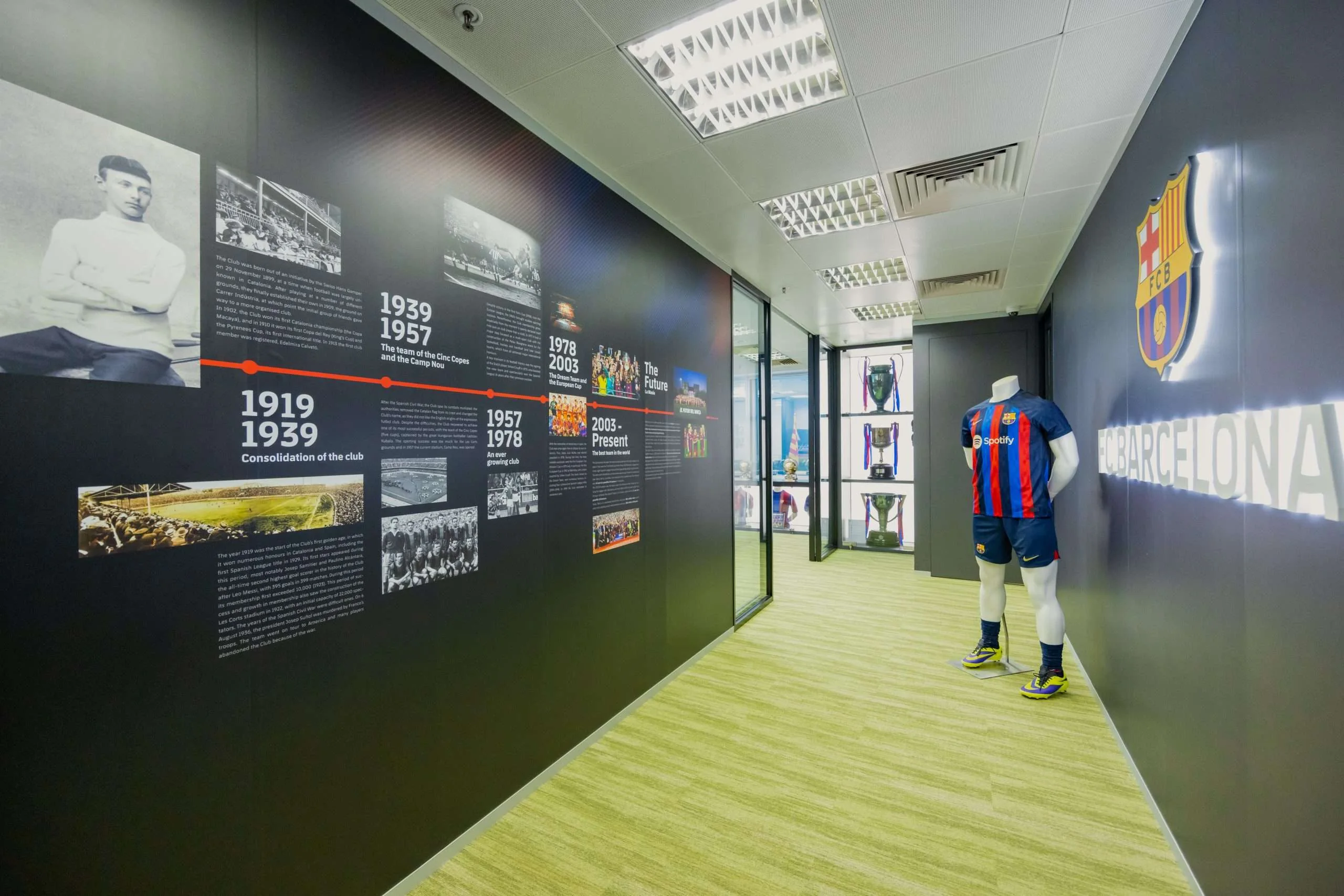 MJPM case study showing a completed workplace corridor with durable finishes, wayfinding and integrated display elements